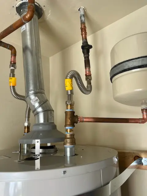 Water heater installation and plumbing repair in Divine Redeemer